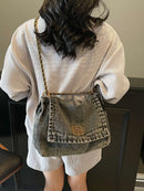 Bolsa jeans corrente 