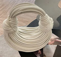 Bolsa em trança, nó estiloso e toque de glam