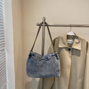 Bolsa jeans corrente 