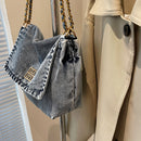 Bolsa jeans corrente 